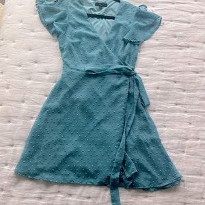 Lulus “Much to Celebrate Slate Swiss Dot Flutter Sleeve Wrap Mini Dress”